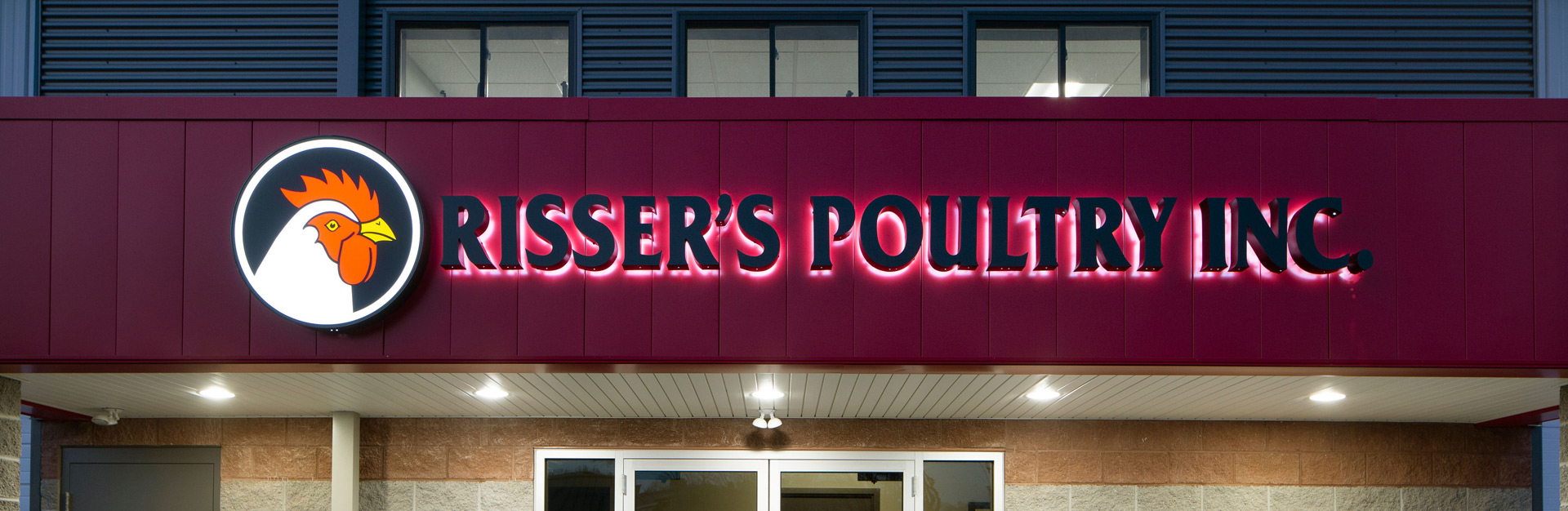 Exterior view of the Risser's Poultry Inc. sign